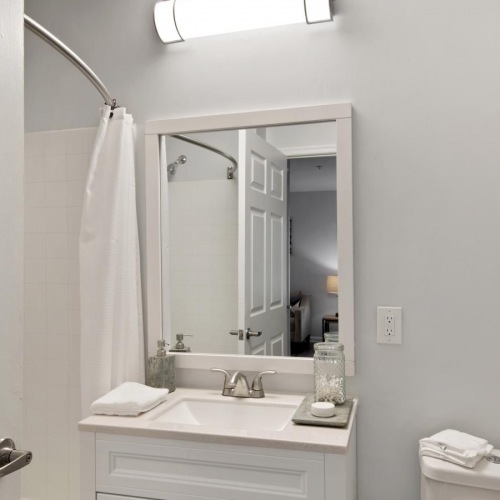 Bathroom options with thoughtful details a bathroom with a mirror and sink