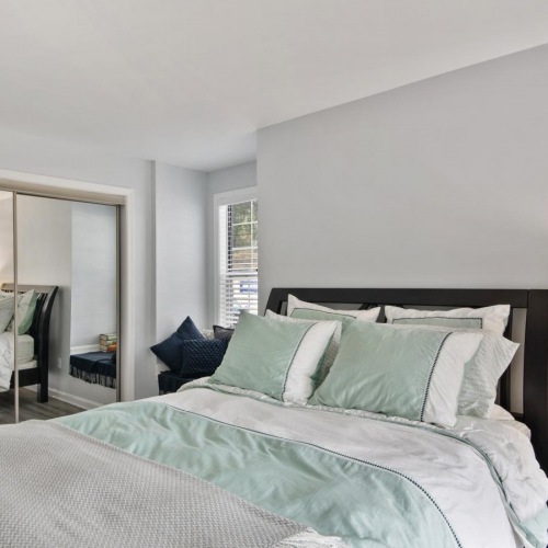 Bedroom options to fit every lifestyle a bedroom with a large glass door